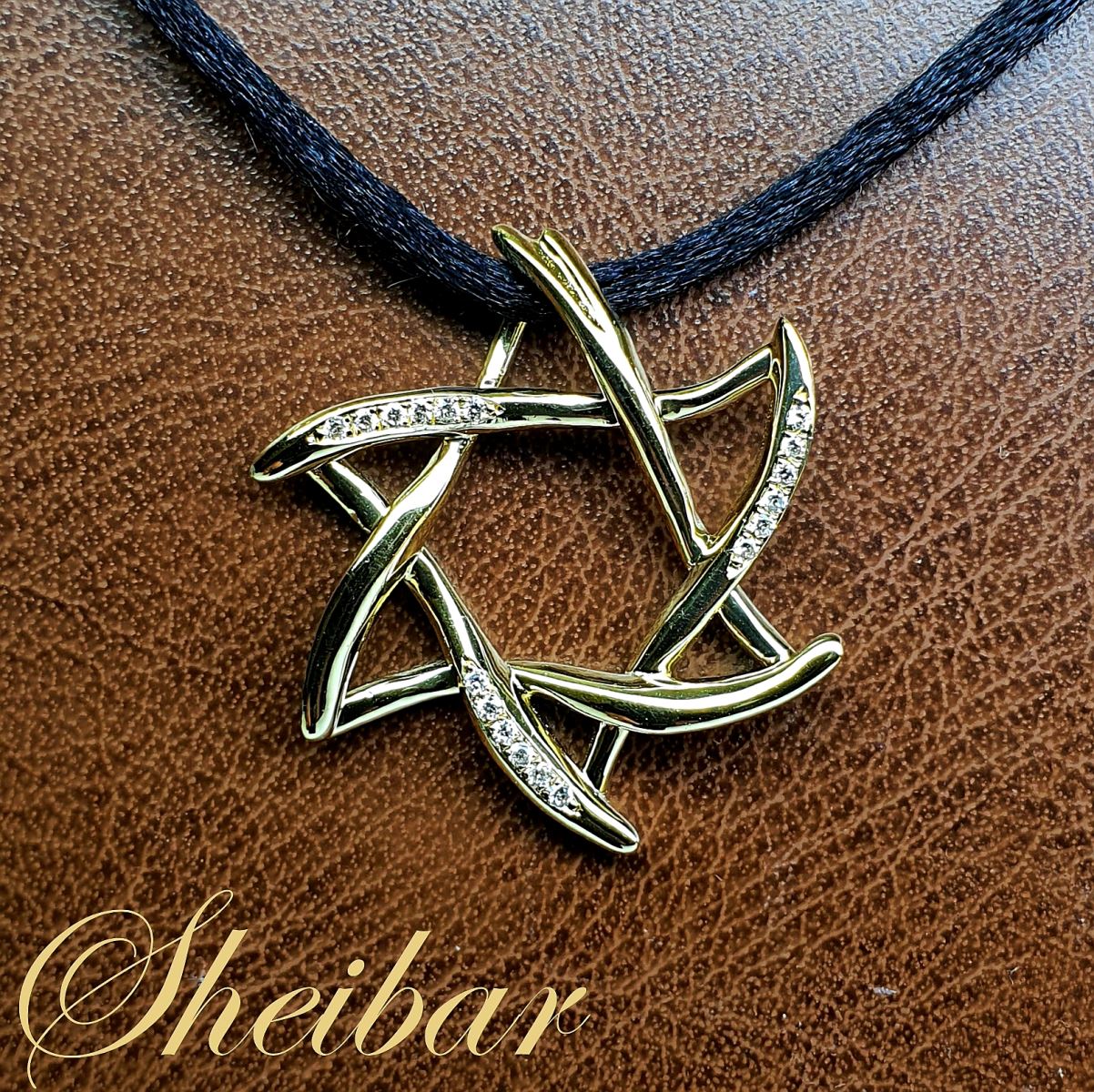 תכשיטי זהב ויהלומים לגבר- תליון מגן דוד מעוצב